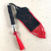 Czarno-czerwony wskaźnik – wyjątkowa zakładka do książki z chwostem